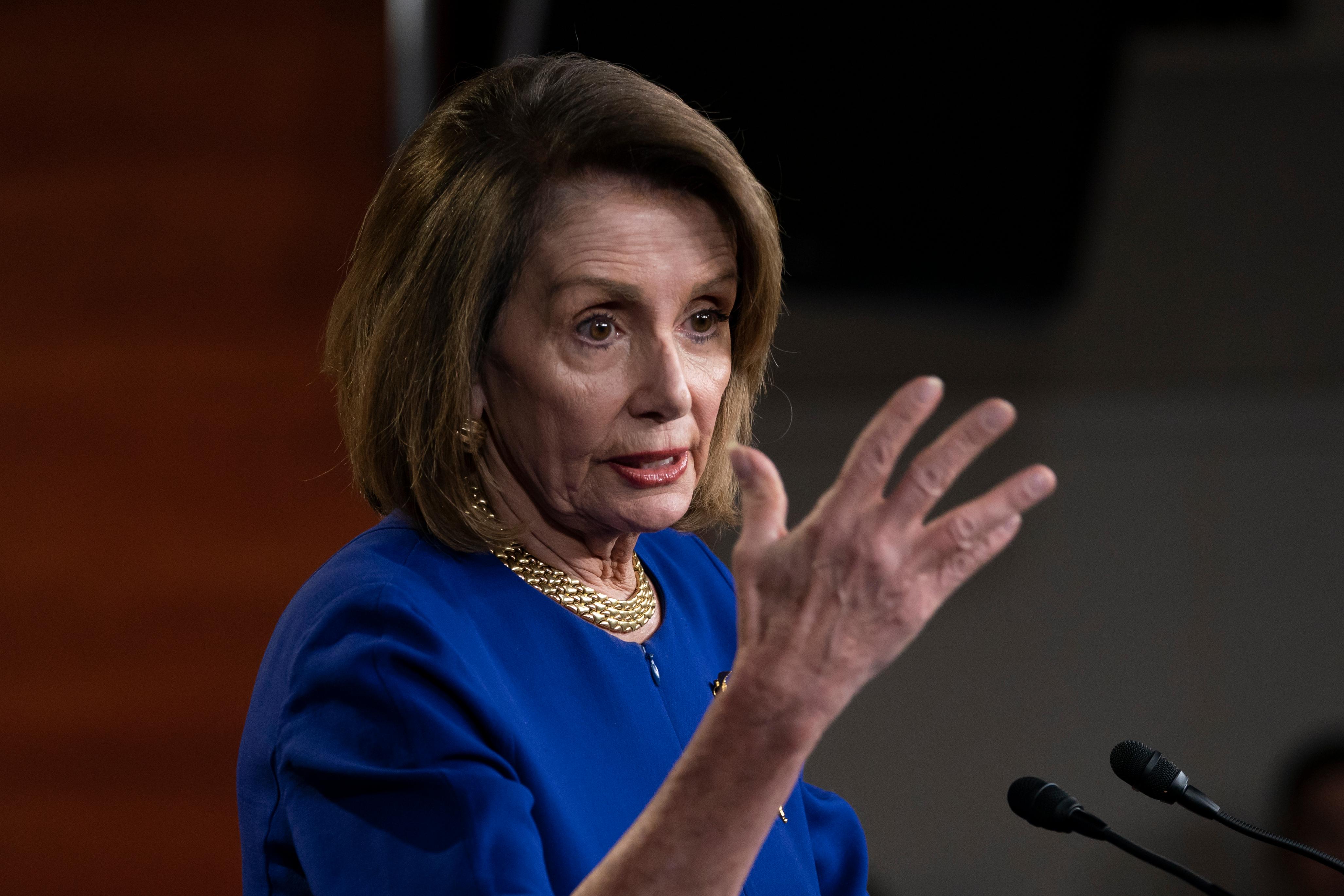 with reporters during her weekly news conference, on capitol