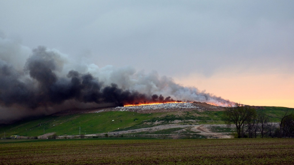 Downwind residents asked to shelter in place as massive landfill fire