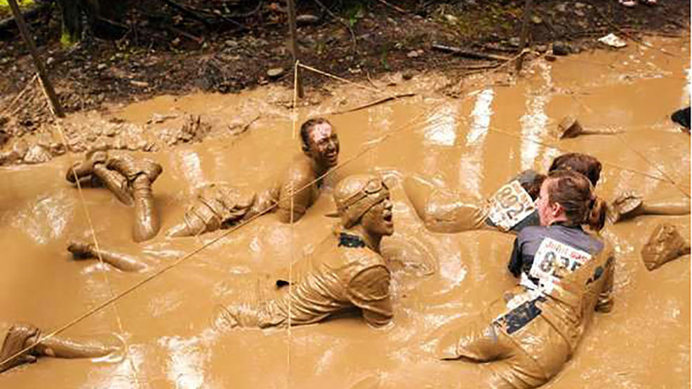 'You WILL get dirty' 1,000 to face miles of muck at JBLM Mud Run KOMO