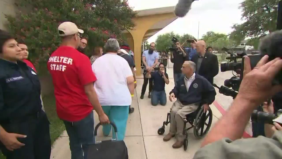 Gov Abbott stops by shelter at Kazen Middle School WOAI